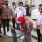 Wali Kota Bandarlampung Eva Dwiana membuka Turnamen Hellau E-Sport Championship (HEC) Season 5 yang digelar ESI Bandarlampung di Kafe Koma Space, Rajabasa, Jumat (28/1). Foto: Netizenku.com