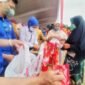 Pemkot Bandarlampung menggelar operasi pasar murah minyak goreng dan sembako di Kecamatan Bumi Waras, Senin (14/2). Foto: Netizenku.com