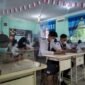 Siswa SMP Negeri 1 Kota Bandarlampung mengikuti PTM Terbatas dengan protokol kesehatan Covid-19, Senin (21/3). Foto: Netizenku.com