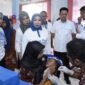 Pj Bupati Tubaba M Firsada menghadiri kegiatan intervensi serentak pencegahan stunting di Tiyuh Marga Kencana, Kecamatan Tulangbawang Udik. (Arie/NK)