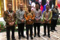 Pj Bupati Pringsewu, Marindo Kurniawan saat menghadiri Plpenyampaian LHP LKPP 2023. (Ist/NK)