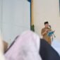 Sekda Kabupaten Pesawaran Wildan, membacakan sambutan pada pembukaan Seleksi Tilawatil Quran di Pondok Pesantren Ash Shidiqiah, Desa Bagelen. (Soheh/NK)