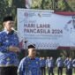 Pj Bupati Tubaba M Firsada, memberi arahan kepada para ASN di lingkup Pemkab setempat pada apel bulanan, Rabu (17/7/2024). (Arie/NK)