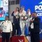 Lifter Lampung Sri Hartati berhasil berdiri pada podium tertinggi setelah memastikan merebut medali emas pada PON XXI Aceh-Sumut 2024. (Iwan/NK)