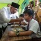 Rahmat Mirzani Djausal saat Meninjau Pelaksanaan Program MBG di berbagai sekolah Kota Metro, Senin (13/1), Foto: Istimewa.