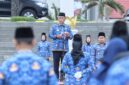 Staf Ahli Gubernur Bidang Pemerintahan, Hukum dan Politik, Ganjar Jationo saat menjadi pembina upacara bulanan di lingkungan Pemerintah Provinsi Lampung, lapangan KORPRI, Jum'at (17/1), Foto: Diskominfotik Provinsi Lampung.