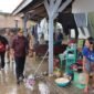 Pj Gubernur Lampung, Samsudin, saat meninjau wilayah terdampak banjir di Kabupaten Pringsewu, Selasa (21/1), Foto: Diskominfotik Provinsi Lampung.