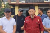 Saprudin Tanjung dan Abzari Zahroni saat mendatangi Polda Lampung, Kamis (19/6/2025), Foto: Soheh/NK.