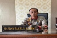 Plt Kepala BKPSDM Lampung Barat, Mazdan Bakri saat ditemui di ruang kerjanya, Selasa (22/7/2025). Foto: Iwan/NK.