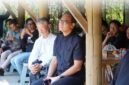 Naoto Fukasawa tengah menikmati Tari Nenemo yang dipentaskan di Komplek Baduy, Ululan Nughik, Tulang Bawang Barat 